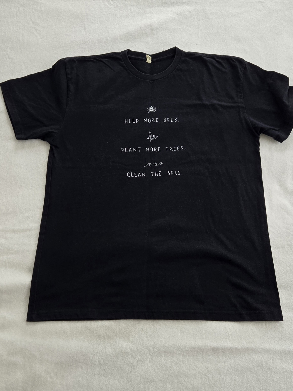 Next Level Apparel Black Tee with White Eco Graphic